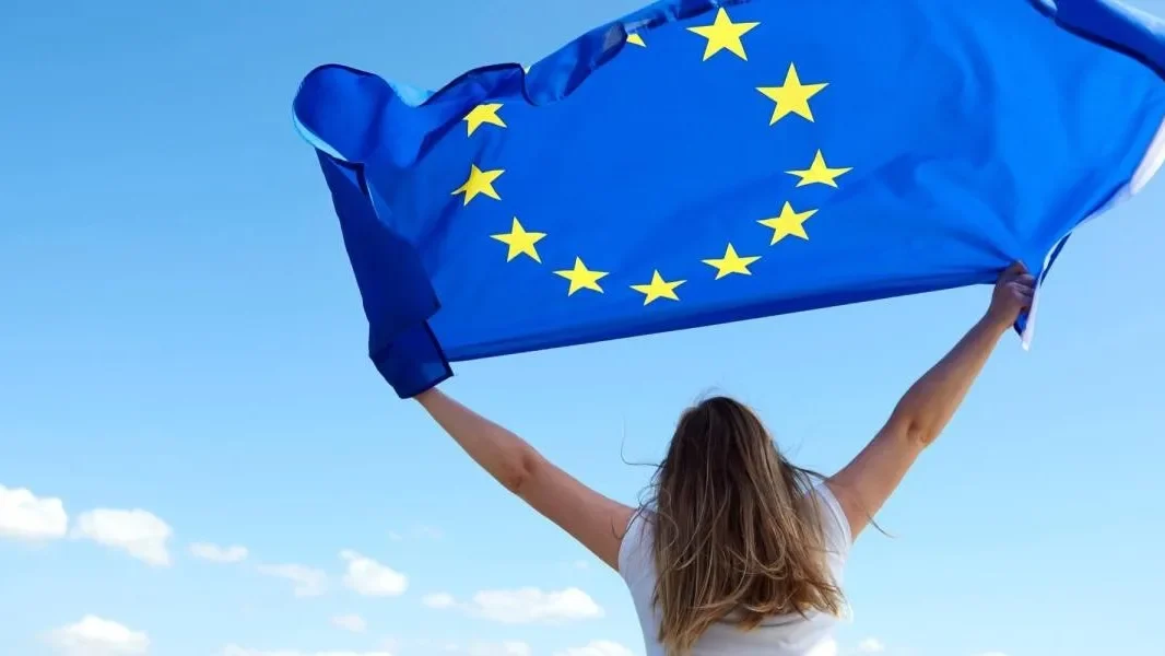 People celebrating shared experiences through European community membership
